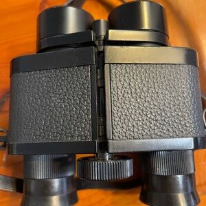 Bushnell Bausch & Lomb 7 power x 25mm Binoculars, Shoulder Strap on case.